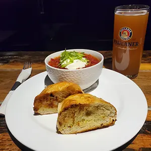 Celebrate Oktoberfest with a Pig & Duke Food Special: $12.95 • What’s Oktoberfest without a Classic Borscht; true vegetarian style! (GST Not Included | House Rules Apply) [Picture: Pig & Duke Plated Pig & Duke Classic Borsch and a Paulaner Pint]
